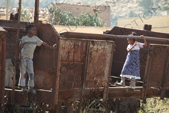 Children Playing on an Old Railway Car in a Station along the Asmara to Massawa Railway Line