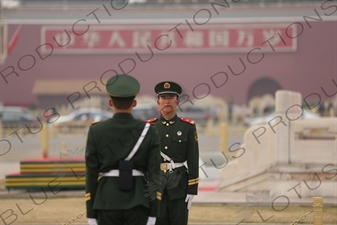 Soldiers Changing the Guard at the Base of the Flagpole in Tiananmen Square in Beijing