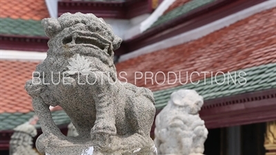 Stone Lion Guardian Statue at the Emerald Temple/Chapel (Wat Phra Kaew) at the Grand Palace (Phra Borom Maha Ratcha Wang) in Bangkok