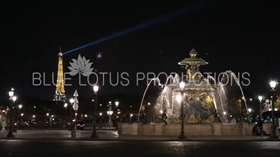 Eiffel Tower (Tour Eiffel) and the Fountain of the Rivers (Fontaine des Fleuves) in Place de la Concorde in Paris