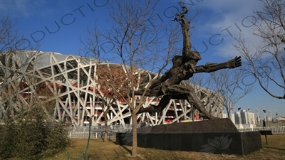 Sculpture in front of the Bird's Nest/National Stadium (Niaochao/Guojia Tiyuchang) in the Olympic Park in Beijing