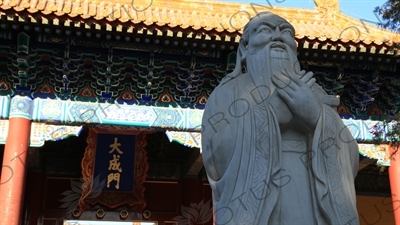 Statue of Confucius in front of the Gate of Great Success (Dacheng Men) in the Confucius Temple in Beijing