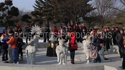 Tourists Taking Photos with Statues of the Twelve Zodiac Animals/Figures outside the Korean National Folk Museum at Gyeongbok Palace (Gyeongbokgung) in Seoul